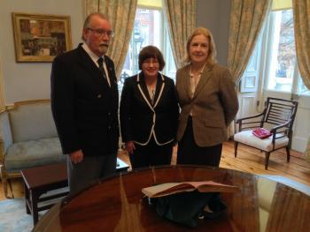 Tom Geraghty, Mary Clark, Margaret Hayes with Fire brigade log book