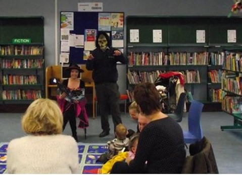 Witch reading at the Ballymun Library Toddler Book Club