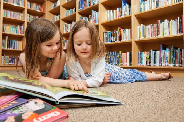 Two children reading