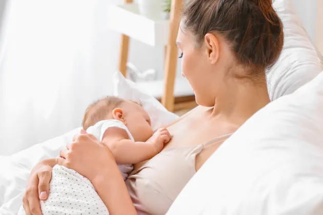 Image of a woman breastfeeding her child
