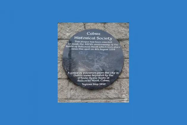Image of Cabra Historical Society plaque on blue background
