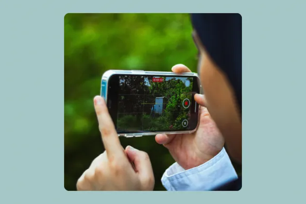 Image of someone taking a photograph using a smartphone