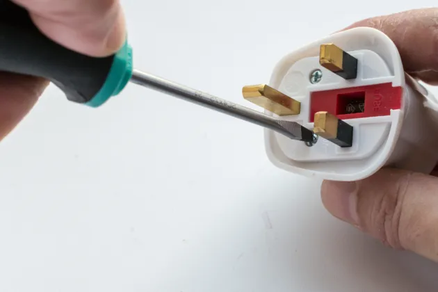 Image of a plug being rewired