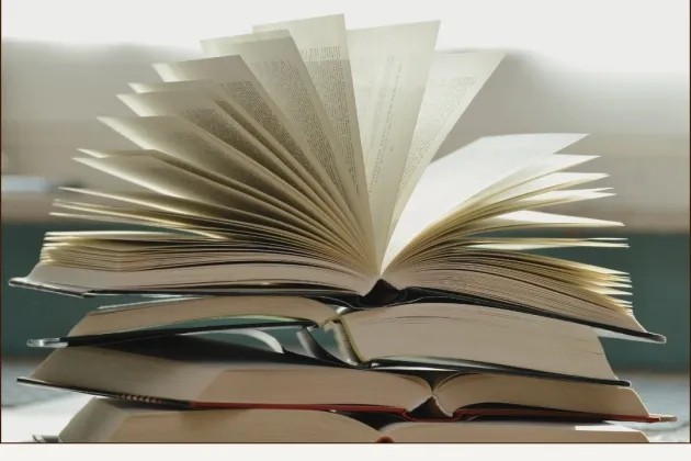 Books piled together