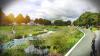 an artist's drawing if the santry river bordered by greenery and a cycle lane.
