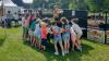 Children gathered around in a park