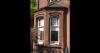 brick house with two windows