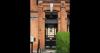 protected structure front door brick building