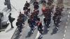 Birds eye view of the band on the street on a bright day