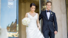 couple walk down steps of city hall on wedding day