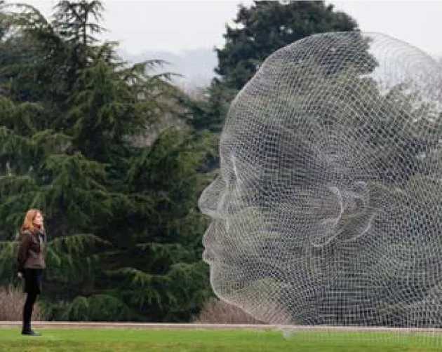 Image of sculpture Nuria and Irma by Juame Plensa in Yorkshire Sculpture Park