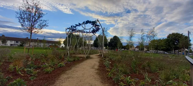 Image of a path with bushes on either side