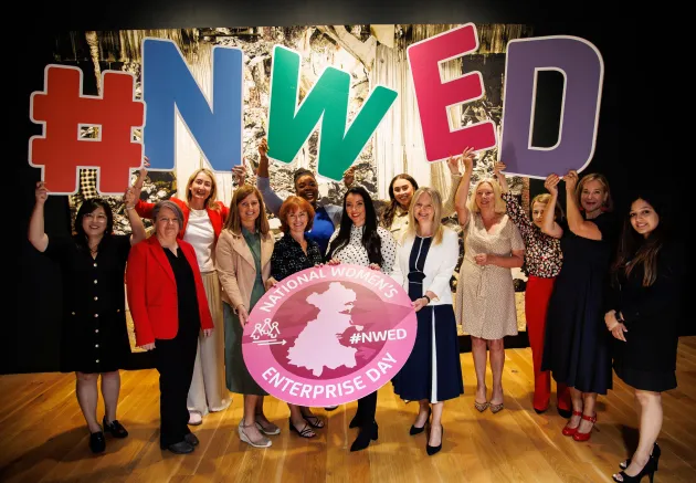#NWED Women holding sign for National womens day
