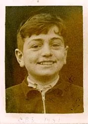 Sepia photograph of a smiling John V O'Connor