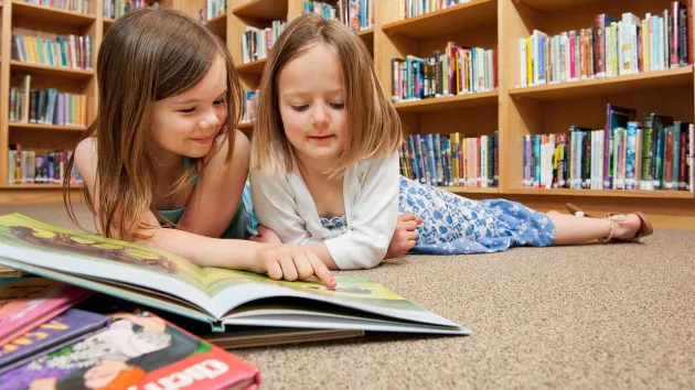 Two children reading