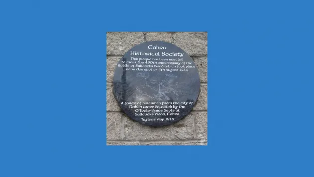 Image of Cabra Historical Society plaque on blue background