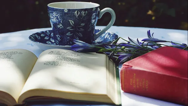 poetry book, teacup and flowers