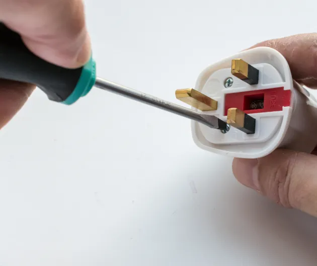 Image of a plug being rewired