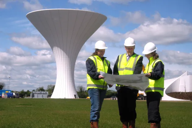 Engineers in front of Sillogue Water Tower