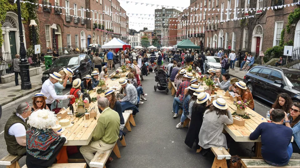 Image of people dining around Housing streets 