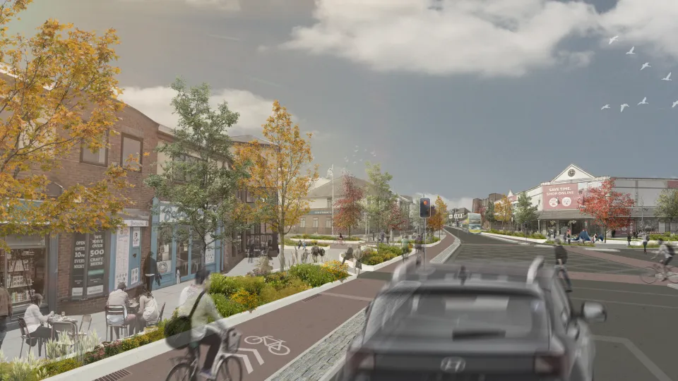 An artist's impression of the proposed scheme showing improved walking and cycling facilities in the heart of Finglas Village.