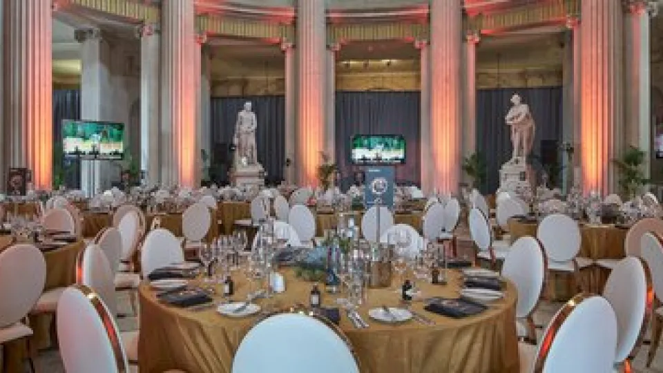 tables and chairs set up for corporate event
